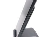 a cell phone that is sitting on top of a stand