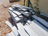 a pile of concrete blocks sitting on the ground