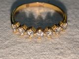 an image of a diamond ring on a table