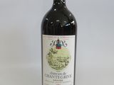 bottle of red wine with a map of france on the label