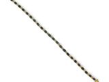 a black and gold bracelet with a cross on it