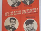 une vieille affiche de cinéma représentant quatre hommes coiffés de chapeaux et portant la moustache