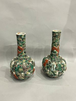 two vases that have animals on them on them