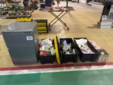 several bins of assorted items sit in a large warehouse