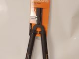 an image of a pair of black pliers on a white surface