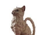 statue d'un chat assis sur un skateboard posé sur une surface blanche