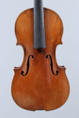 an old violin with a bow on a white background