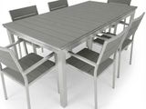 une table et des chaises disposées sur un fond blanc