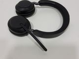 a pair of headphones sitting on top of a white table