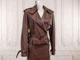 brown leather trench coat on a mannequin mannequin mannequin mannequin mannequin mannequin mannequin mannequin manne