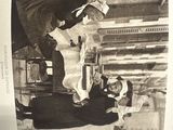 a black and white photo of a woman and a child