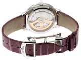the watch has a brown leather strap and a silver buckle