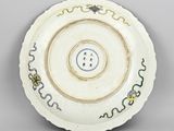 an image of a white plate with a blue and yellow design on it