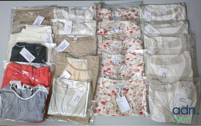 many different types of clothing in a box