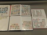 many different types of stamps on the pages of a book