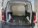 a white van with the back door open and the back of it ' s cargo door open