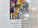 a poster with a picture of a man and a woman on it