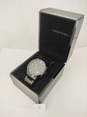 a watch that is in a box on a table
