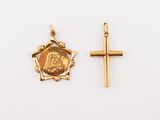 two gold crosses and a gold coin on a white background