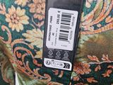 a close up of a dress with a price tag on it