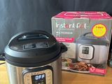 a box of instant pot sitting on a table next to a box of instant pot