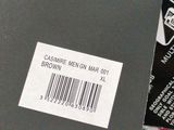 a tag that says cashmere men mar 011 brown on it