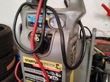 an image of a car battery charger in a garage