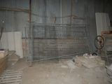 an image of a cage in a building that is under construction