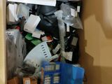 a box full of assorted items in the corner of the room