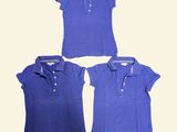 three women ' s blue polo shirts on a white background