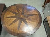 a table that has a laptop on top of it