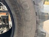 a close up of a tire on the side of a road