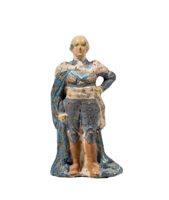 figurine of a woman in a blue dress with a blue cape