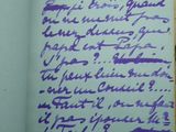 purple ink on a piece of paper with writing on it