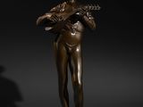 a bronze statue of a woman holding a mandolin