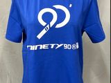 the t - shirt is blue and has a white logo on it