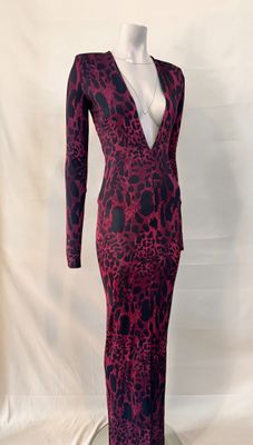 a red and black dress on a mannequin mannequin mannequin mannequin mannequin mannequin mannequin mannequin mann