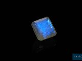 an image of a blue stone with a black background