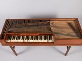 a piano that is sitting on top of a table