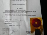 a piece of paper that has a picture of a doughnut on it