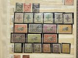 an open book with a bunch of different stamps on it