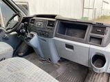 a dashboard of a truck with a steering wheel
