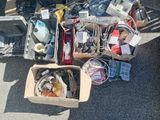 a pile of electronics and other items on the ground