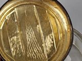 a person holding a gold coin in their hand