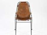 a brown leather chair with metal legs and a leather seat