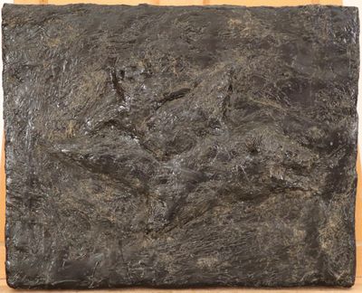 an image of a piece of art on a wooden surface