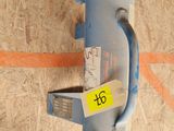 a picture of a blue machine with a yellow tag on it