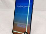 a close up of the back of a smartphone with a screen showing a message on it