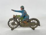 a figurine of a man riding on a motorcycle