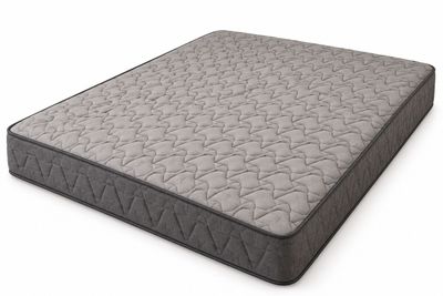 a close up of a mattress on a white surface